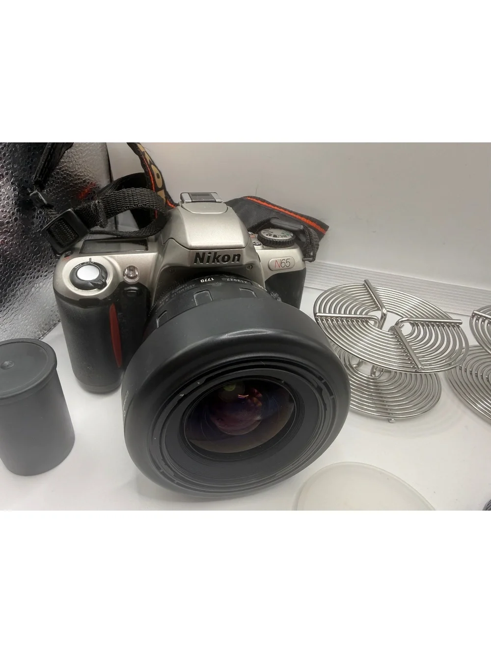 Nikon N65 35-70mm SLR Film Camera with Accessories and Carrying Case